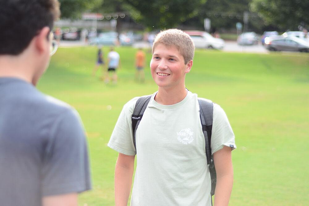Nick Lucovsky, a second-year in civil engineering, speaks about his interest in joining Student Media during the Witherspoon Block Party at Harris Field on Monday, Aug. 22, 2022. Witherspoon's Block Party was an event during Wolfpack Welcome Week that was for helping students get involved with the organizations that are in Witherspoon Student Center.