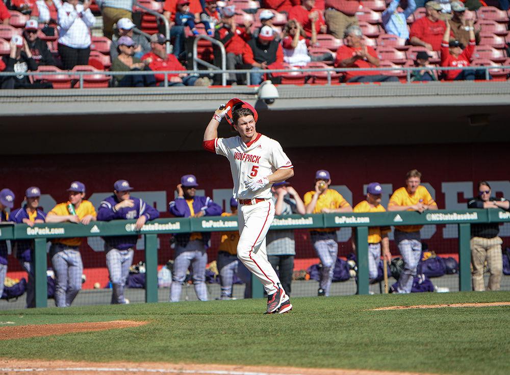 Junior center Patrick Bailey walks to home base after another player hit a home run against Tennessee Tech at Doak Field on Sunday, Feb. 23, 2020. Bailey had 2 runs during the game.