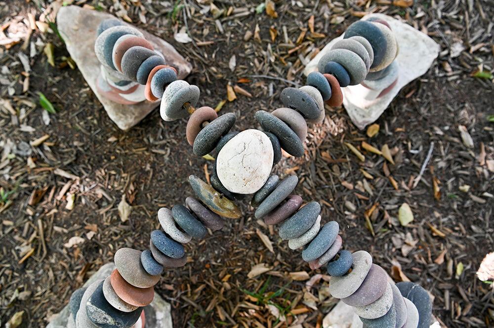 A rock art installation at Gardner Arboretum next to Patterson Hall on Monday, Aug. 8, 2022. The installation is the first of a new &#8220;ephemeral art&#8221; program.