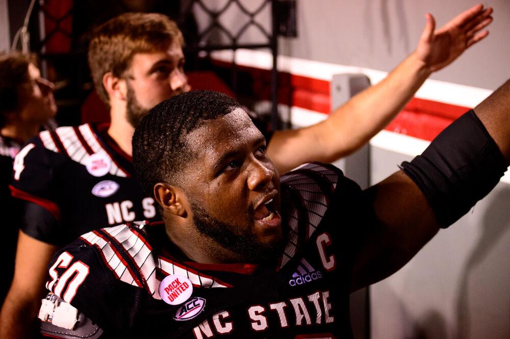 Redshirt junior center Grant Gibson greets fans after the win over Louisiana Tech on Saturday, Oct. 2, 2021 at Carter-Finley Stadium. The Wolfpack won 34-27.
