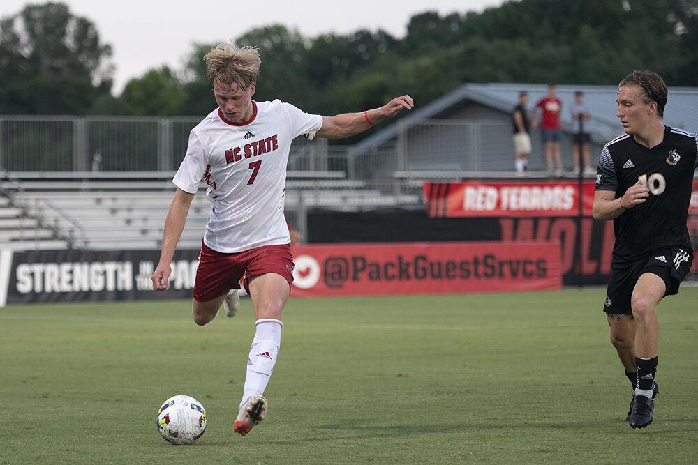 Sophomore defender Jarvis Cleal kicks the ball down the field during the match against the Wofford Terriers on Monday, Aug. 29, 2022 at Dail Soccer Field. Cleal had one shot during the match. The Wolfpack won 4-0.