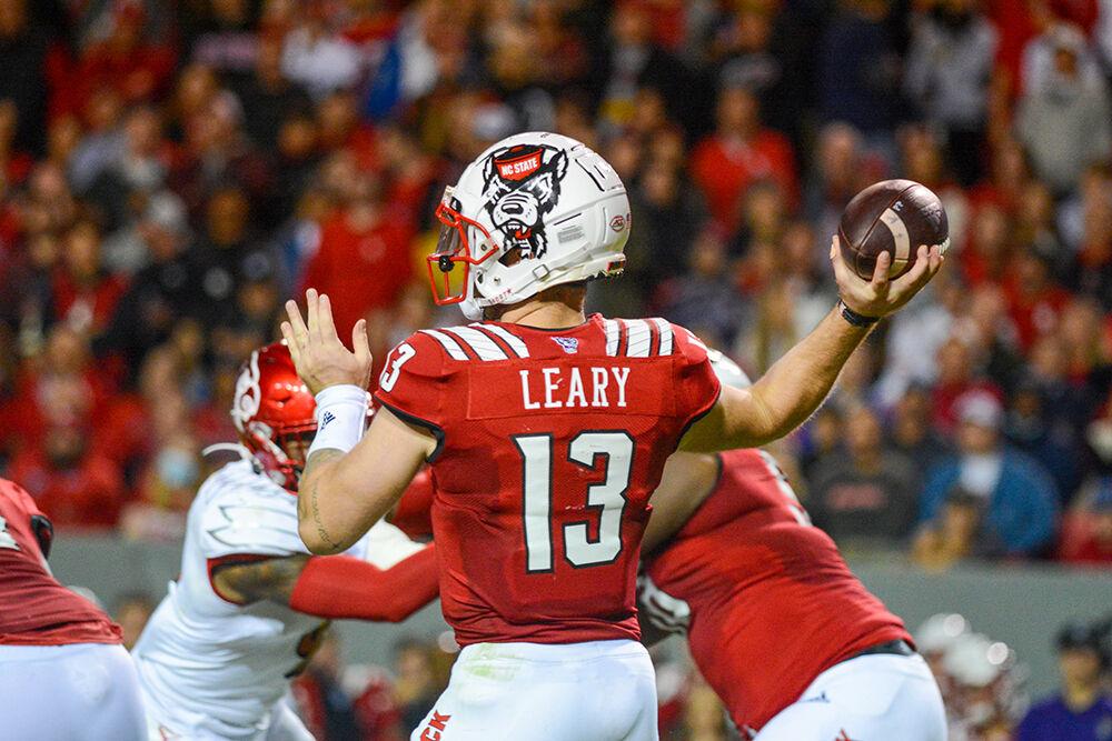 Redshirt sophomore quarterback Devin Leary throws a pass against the Louisville Cardinals on Oct. 20 at Carter-Finley Stadium. Leary passed for 317 yards and 4 touchdowns in NC State's 28-13 victory over Louisville.