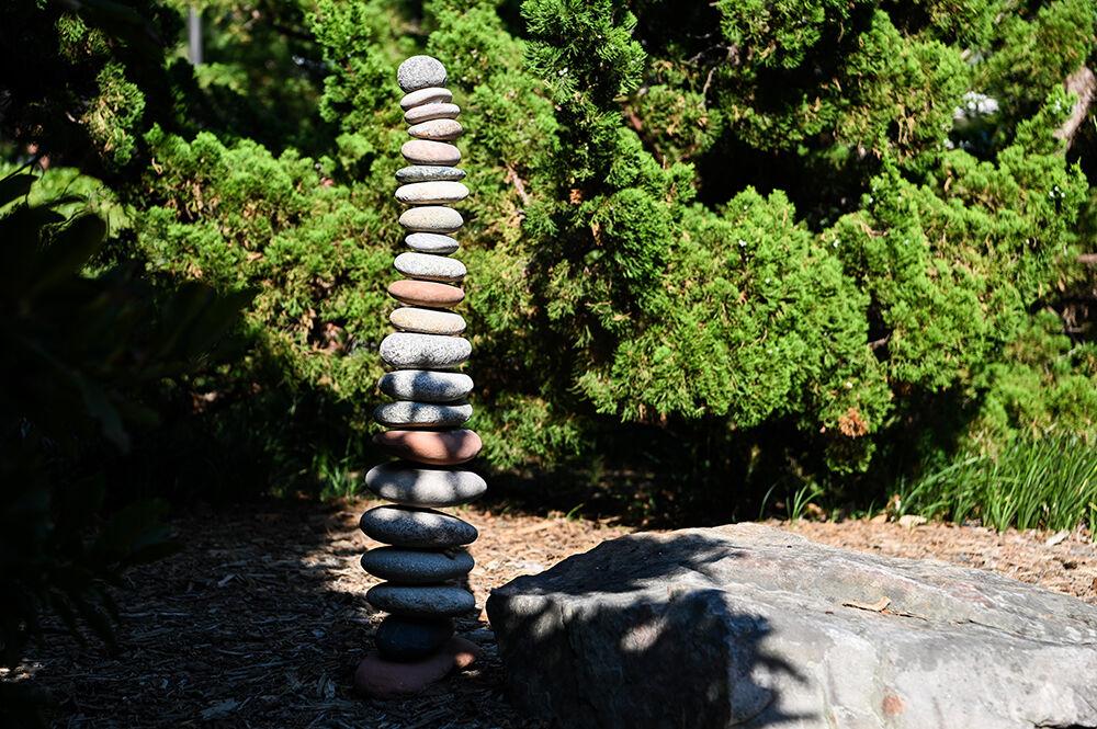 A rock art installation at Gardner Arboretum next to Patterson Hall on Monday, Aug. 8, 2022. The installation is the first of a new &#8220;ephemeral art&#8221; program.