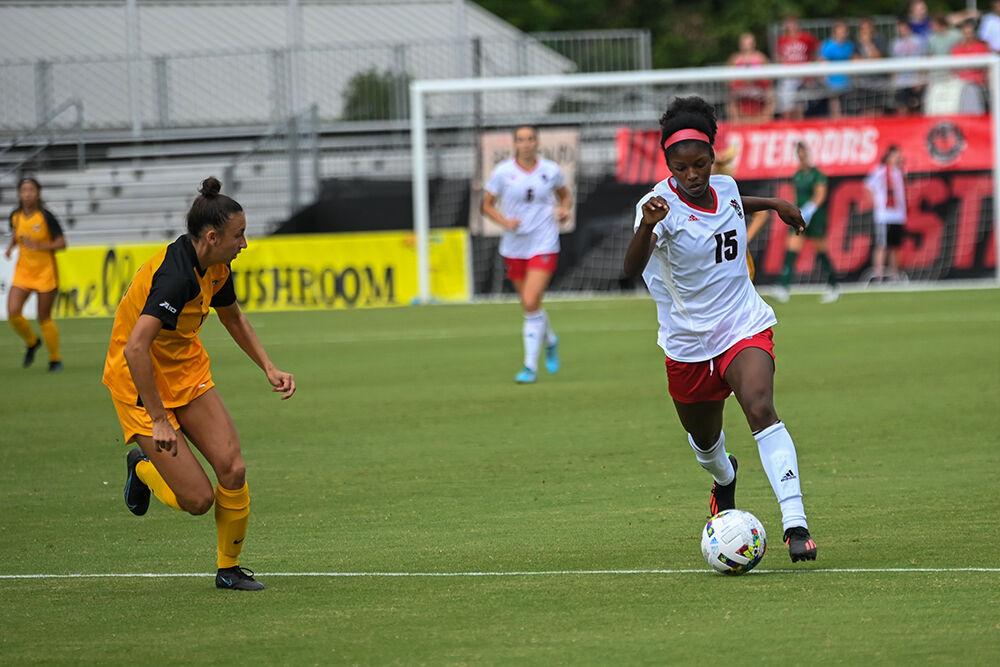 Senior forward Jameese Joseph dribbles the ball past a defender in the match&#160;against Virginia Commonwealth on Sunday, Aug. 21, 2022 at Dail Soccer Field. Joseph scored one goal during the game. NC State won 2-1.