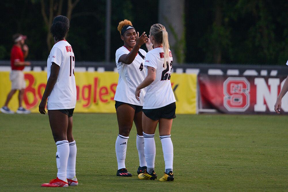 Senior forwards Leyah Hall-Robinson and Alexis Strickland shake hands before the women's soccer match against Georgetown at Dail Soccer Field on Sunday, Aug. 28, 2022. NC State tied with Georgetown 2-2.
