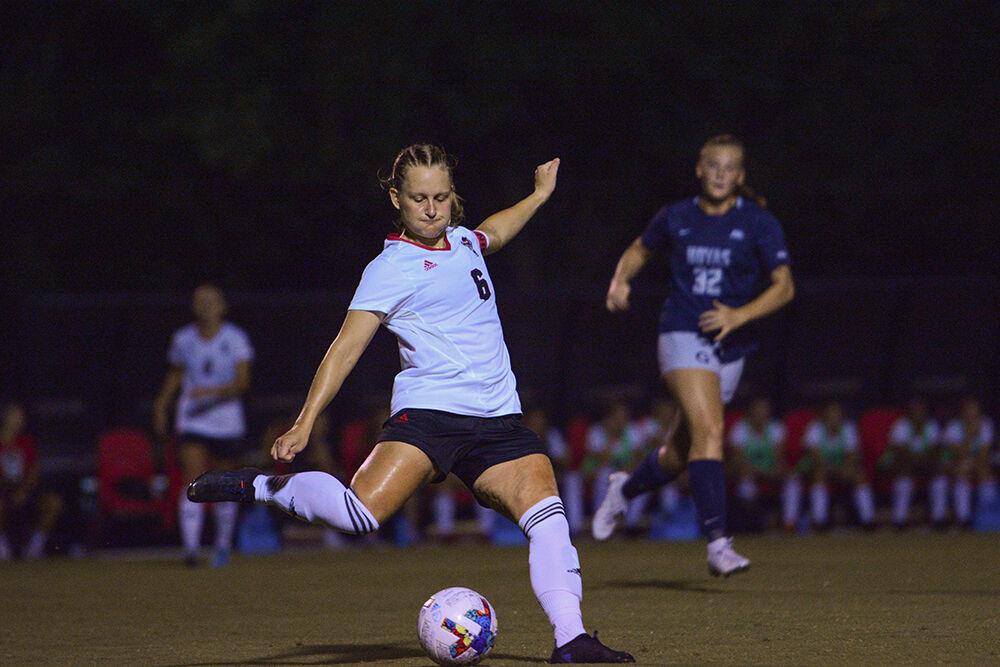 Graduate defender Lulu Guttenberger gears up for a kick during the women's soccer match against Georgetown at Dail Soccer Field on Sunday, Aug. 28, 2022. NC State tied with Georgetown 2-2.