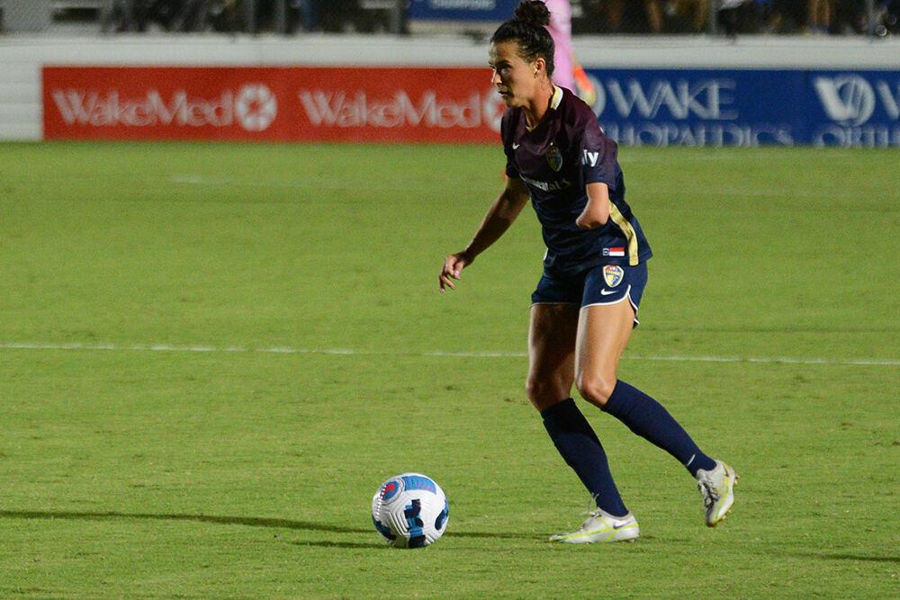 North Carolina Courage defender Carson Pickett dribbles the ball during the NC Courage match against Gotham FC on Saturday, Sept. 24, 2022 in Sahlen's Stadium at WakeMed Soccer Park. NC Courage won the match 3-0.