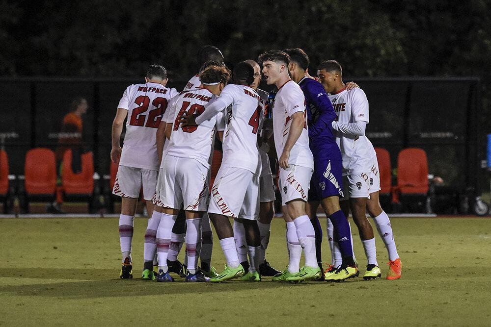 NC State men's soccer team huddles during the match against Virginia Tech on Friday, Sept. 23, 2022 at Dail Soccer Field. NC State beat Virginia Tech 1-0.
