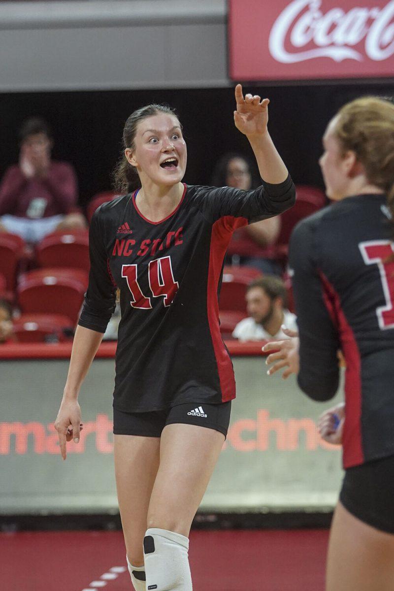 Sophomore outside hitter Martyna Leoniak celebrates with her team against Western Carolina University on Friday, Sept. 9, 2022 at Reynolds Coliseum. Leoniak had two kills in the 3-0 loss to Western Carolina University.