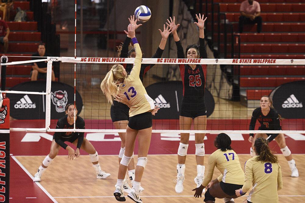 Junior middle blocker Riley Shaak jumps up for a block versus WCU on Friday, Sept. 9, 2022 in Reynolds Coliseum. Shaak had three kills during NC State&#8217;s 3-0 loss to the Catamounts.