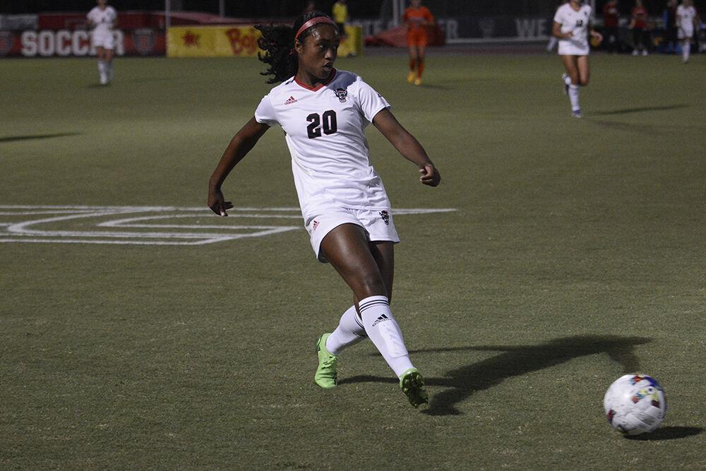 Freshman defender Brooklyn Holt passes the ball during the match against Virginia Tech on Thursday, Sept. 22, 2022 at Dail Soccer Field. NC State lost 1-0.