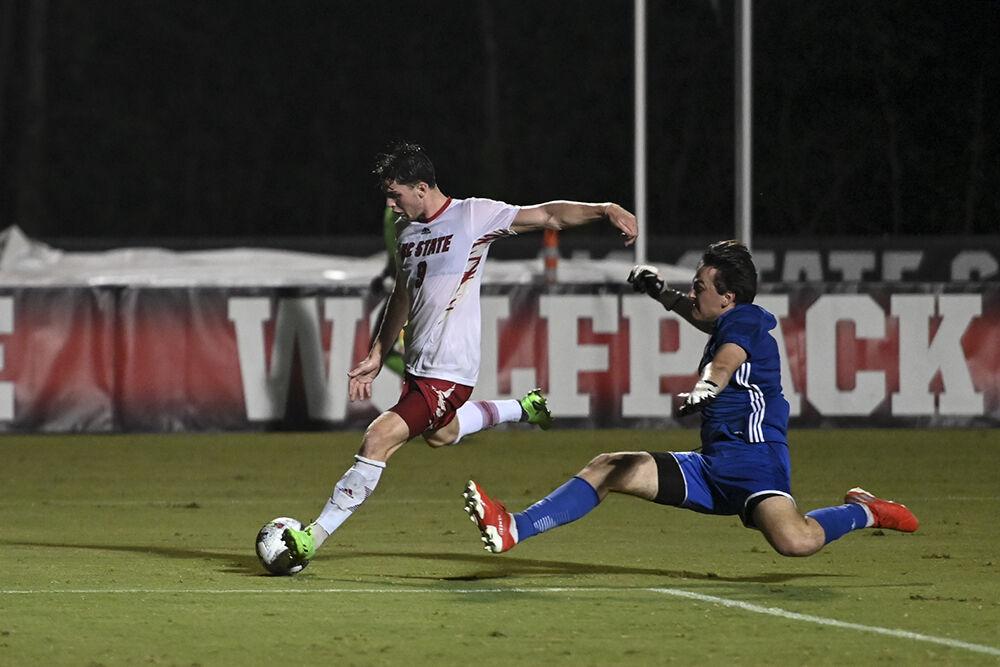 Sophomore forward Luke Hille takes a shot on the goal during the match against Wofford at Dail Soccer Stadium on Monday, Aug. 29, 2022. Hille had one assist. The Wolfpack won 4-0.