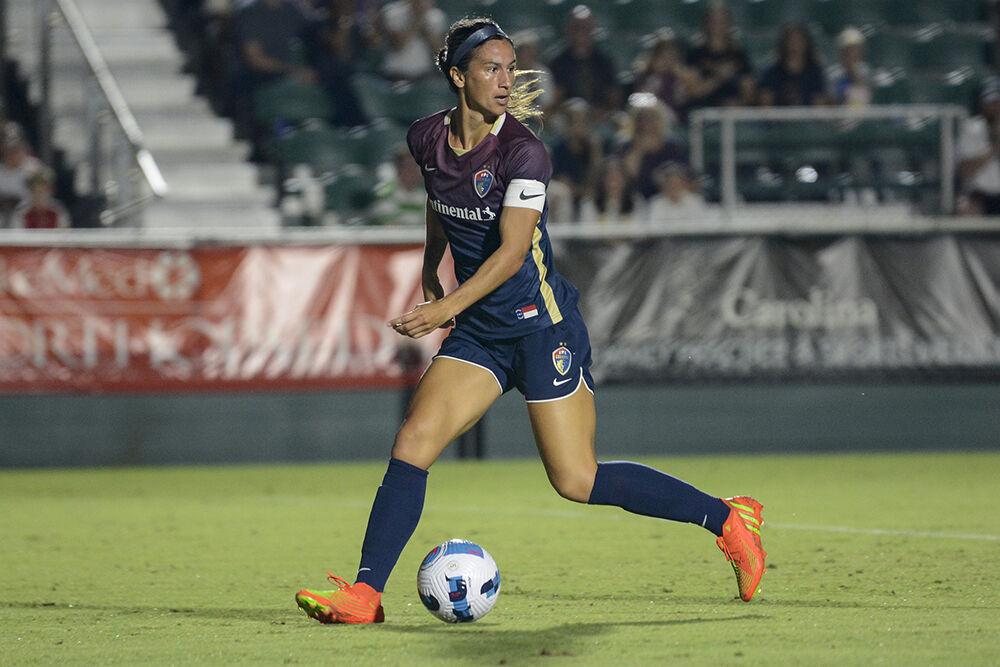 Courage defender Abby Erceg looks back for pressure as she dribbles during the NC Courage match against OL Reign on Friday, Sept. 17, 2022 in Sahlen's Stadium at WakeMed Soccer Park. OL Reign won the match 2-1.