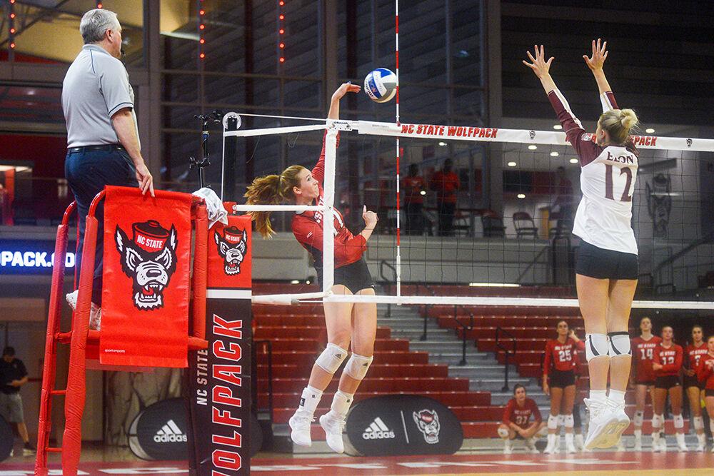 Sophomore opposite hitter Amanda Rice spikes the ball in the game against Elon on Saturday, Sept. 3, 2022 in Reynolds Coliseum. Amanda had 13.5 points and 12 kills in the game. NC State won the game against Elon 3-1.