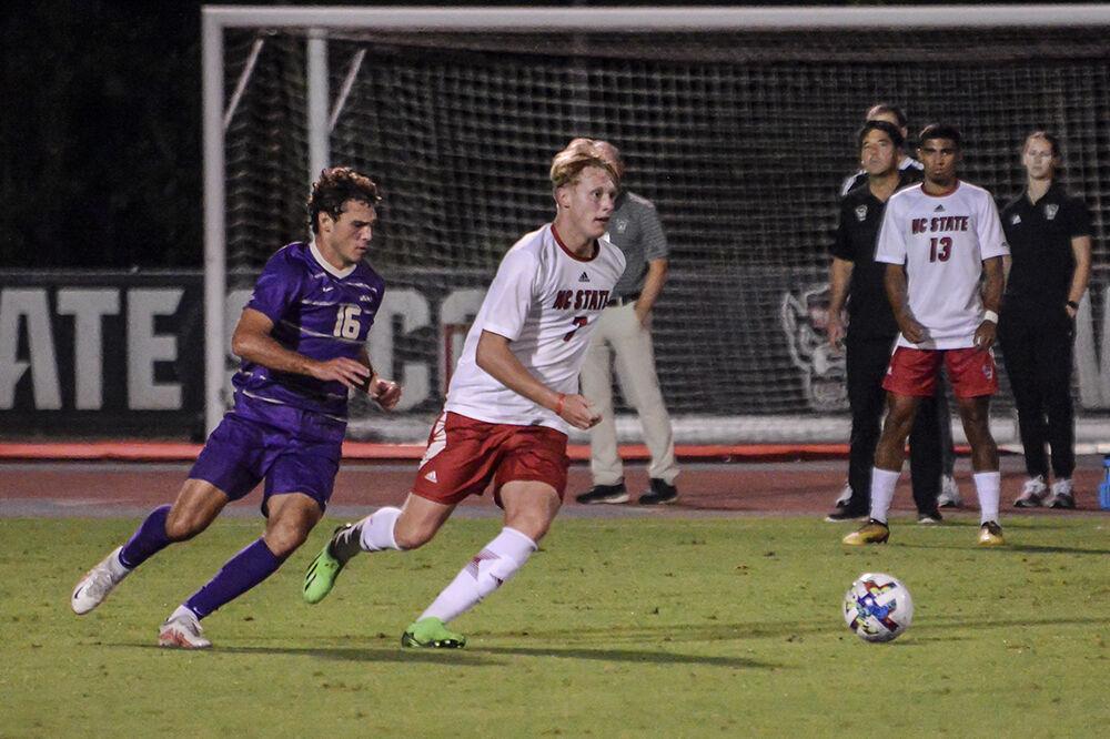 Sophomore defender Jarvis Cleal runs towards the ball during the match against James Madison on Tuesday, Sept. 13, 2022 at Dail Soccer Field. NC State lost 1-0 to James Madison.
