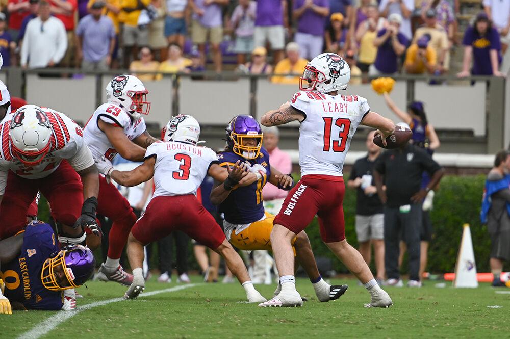 Redshirt junior quarterback Devin Leary drops back to pass during the Wolfpack's football game at Dowdy-Ficklen Stadium on Saturday, Sept. 3, 2022. The Wolfpack beat the Pirates 21-20.