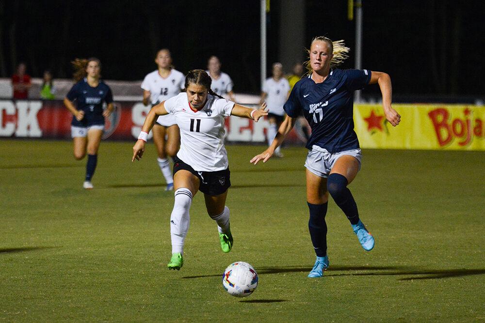 Sophomore defender Fernanda Soto tries to beat a Georgetown player to a loose ball during the match against the Hoyas on Sunday, Aug. 28, 2022 at Dail Soccer Field. The Wolfpack tied the match 2-2.
