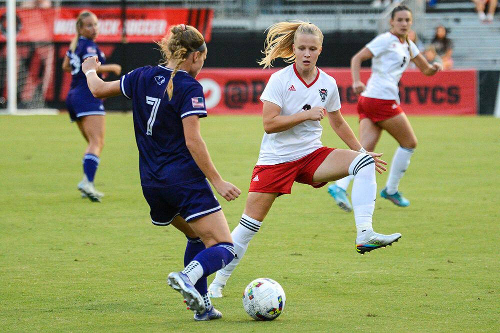 Sophomore defender Nina Zimmer attempts to steal the ball in the game against High Point on Thursday, Sept. 15, 2022 at Dail Soccer Field. NC State won 3-1.