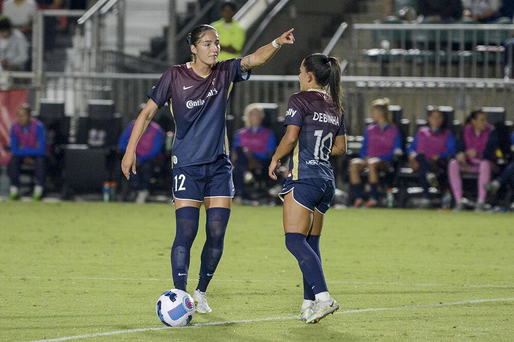 Courage forward Diana Ord&#242;&#241;ez points as she has a discussion with Courage midfielder Debinha during the NC Courage match against OL Reign on Friday, Sept. 17, 2022. OL Reign won the match 2-1.