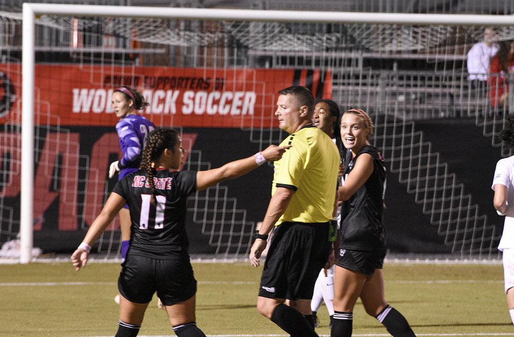 Sophomore defender Fernanda Soto (left) and junior forward Mia Vaughan argue with the referee over a foul during the match against the Blue Devils at Dail Soccer Field on Sunday, Sept. 25, 2022. NC State lost 6-0.