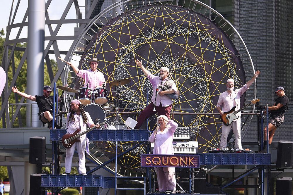 Squonk members take a bow after perfoming at the NC State LIVE block party event at Stafford Commons on Sunday, Sept. 18, 2022. NC State LIVE celebrated its 50th Anniversary with a performance from Squonk, Wolfgang A Cappella, Fusion Dance Crew, interactive crafts and food.