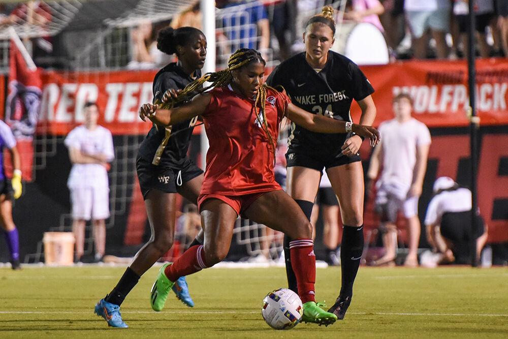 Senior forward Leyah Hall-Robinson fights for control of the ball during the match against Wake Forest on Sunday, Sept. 18, 2022 at Dail Soccer Field. Hall-Robinson assisted with one shot on the goal. NC State won 2-1.