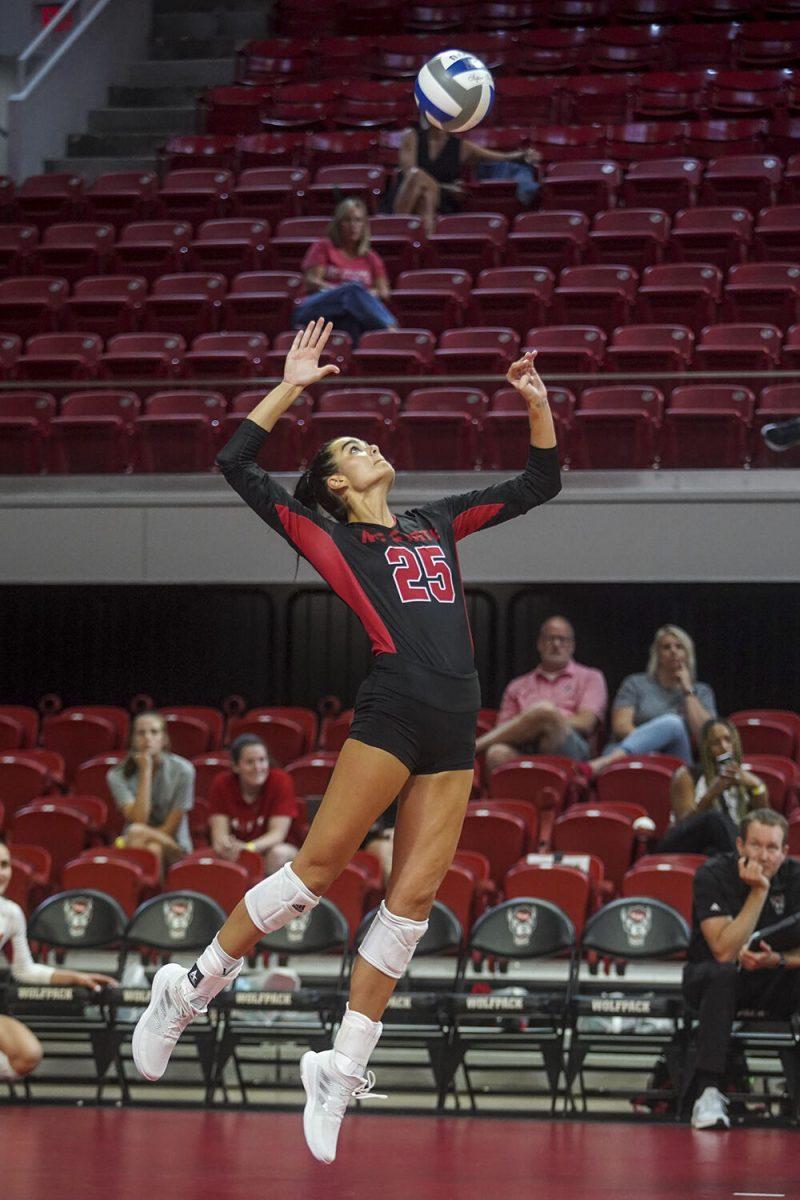 Junior middle blocker Riley Shaak prepares to spike the ball against Western Carolina University on Friday, Sept. 9, 2022 at Reynolds Coliseum. Shaak had three kills in the 3-0 loss to Western Carolina University.