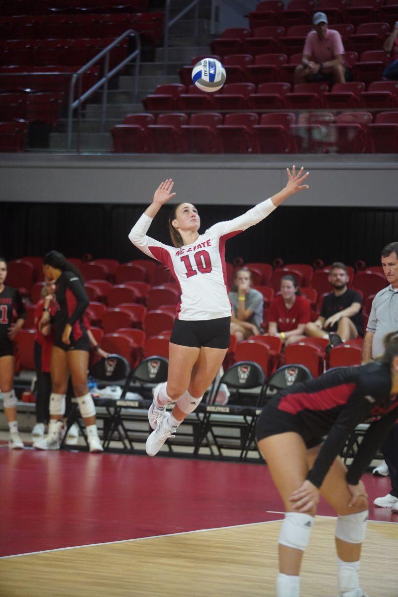 Graduate defensive specialist and libero Priscilla Hernandez prepares to spike the ball against Western Carolina University on Friday, Sept. 9, 2022 at Reynolds Coliseum. NC State lost 3-0.&#160;