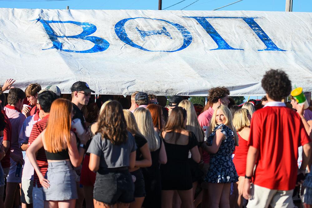 Students tailgate outside of Carter-Finley Stadium before the first football game against USF Thursday, Sept. 2, 2021.&#160;