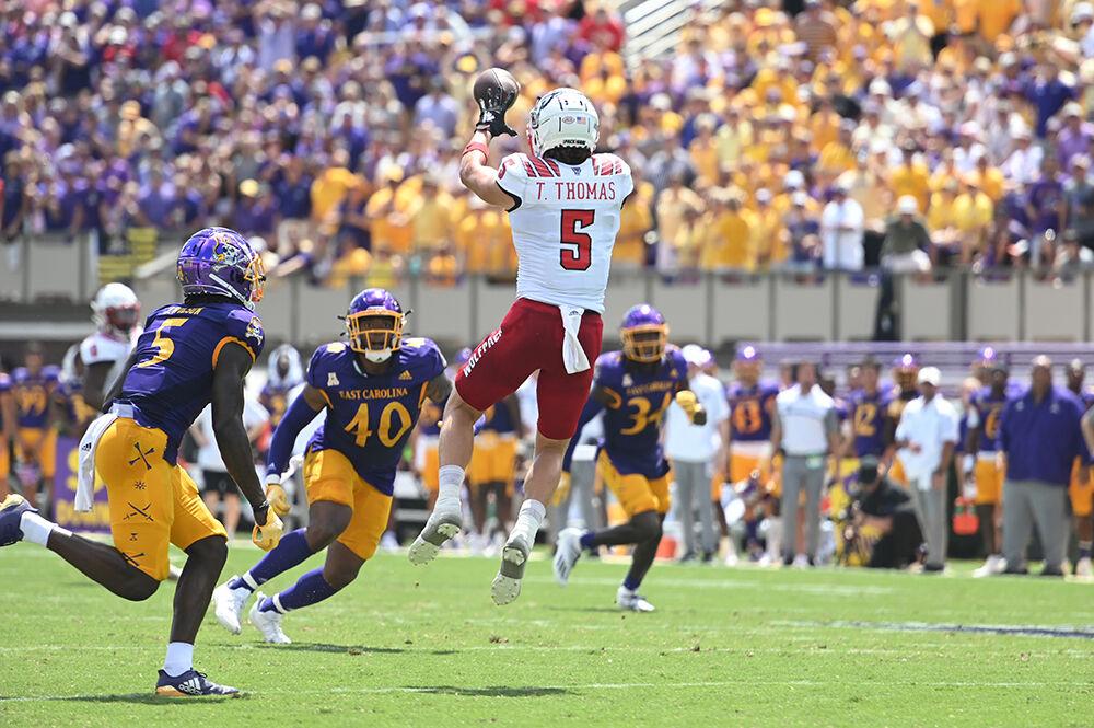 Graduate wide reciever Thayer Thomas catches a pass over the middle during the Wolfpack's football game against the East Carolina Pirates at Dowdy-Ficklen Stadium on Saturday, Sept. 3, 2022. Thomas had four receptions for one touchdown on 58 total yards as the Wolfpack beat the Pirates 21-20.