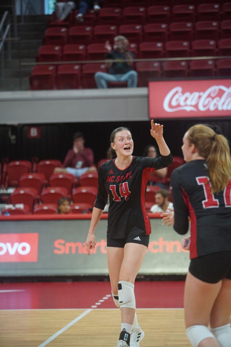 Sophomore outside hitter Martyna Leoniak celebrates with her team against Western Carolina University on Friday, Sept. 9, 2022 at Reynolds Coliseum. Leoniak had two kills in the 3-0 loss to Western Carolina University.