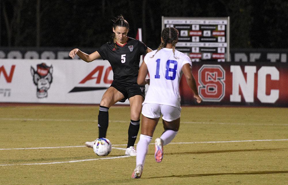 Graduate defender Jenna Butler passes the ball up the field during the match against the Blue Devils at Dail Soccer Field on Sunday, Sept. 25, 2022. NC State lost 6-0.