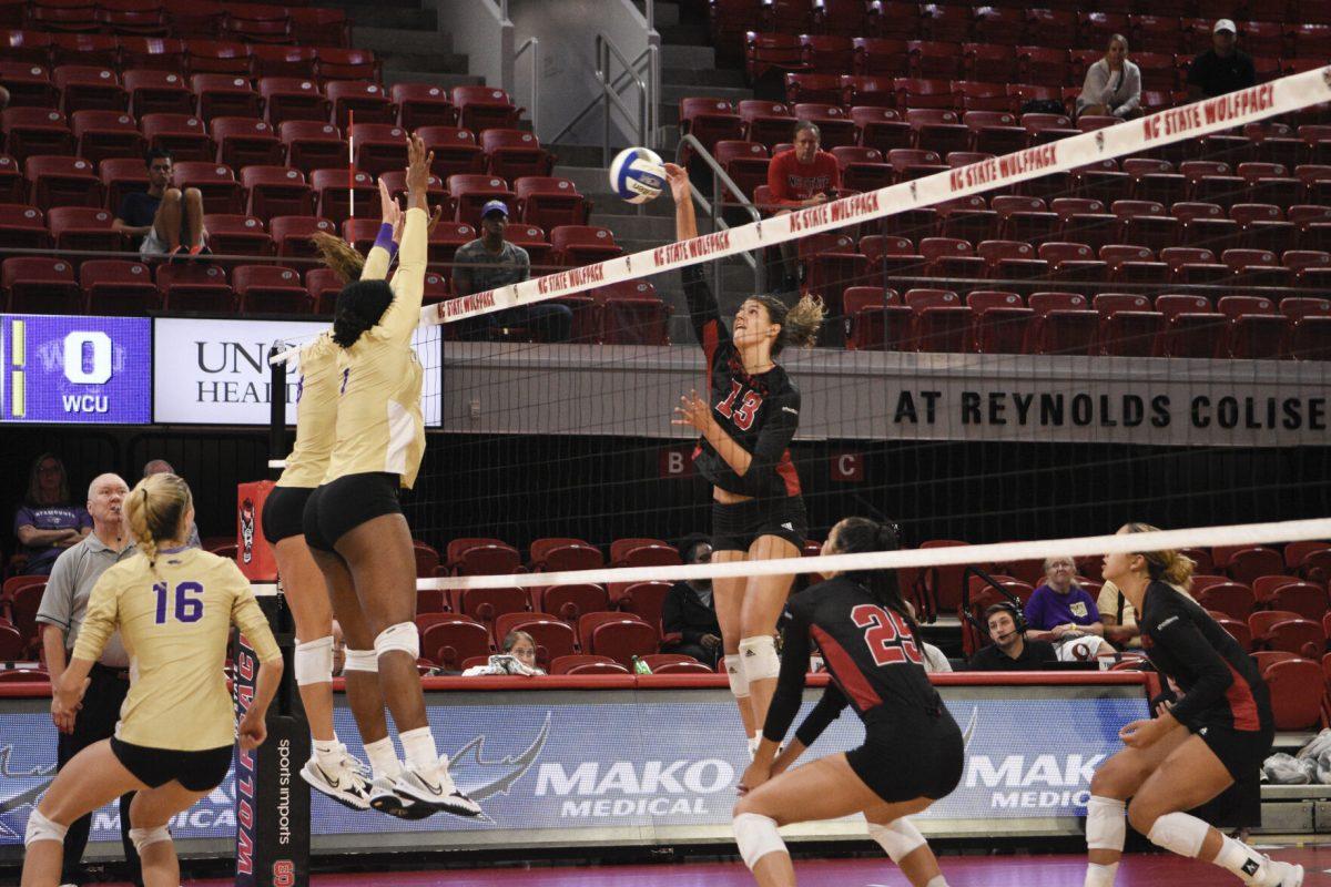 Graduate opposite hitter Vanja Bukilic spikes a ball in the game versus WCU on Friday, Sept. 9, 2022 in Reynolds Coliseum. Bukilic had eight kills during NC State&#8217;s 3-0 loss to the Catamounts.