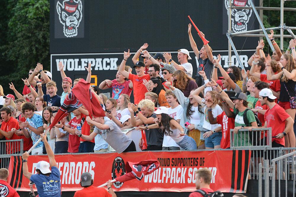Members of the student section celebrate a goal in the game against High Point on Thursday, Sept. 15, 2022 at Dail Soccer Field. NC State won 3-1.