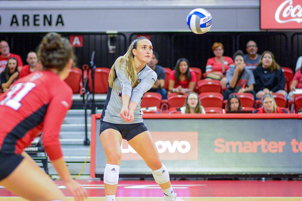 Graduate libero Priscilla Hernandez passes the ball to a teammate in the game against Elon on Saturday, Sept. 3, 2022 in Reynolds Coliseum. Hernandez made 21 digs during the game. NC State won 3-1 against Elon.