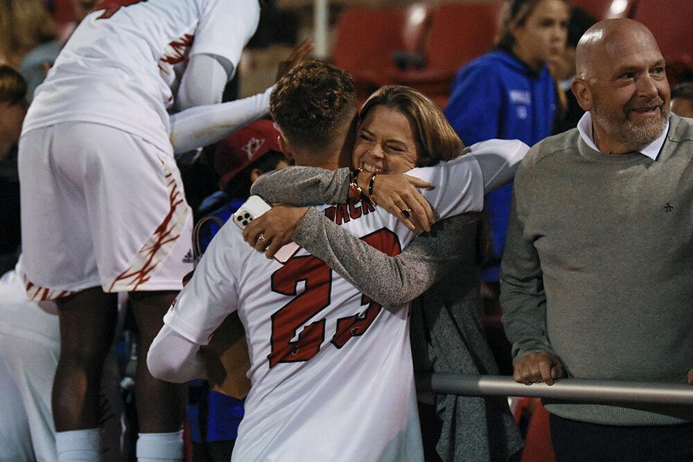 Freshman midfielder Drew Lovelace, left, and Amber Lovelace, right, embrace at the conclusion of the match against Virginia Tech on Friday, Sept. 23, 2022 at Dail Soccer Field. NC State beat Virginia Tech 1-0.