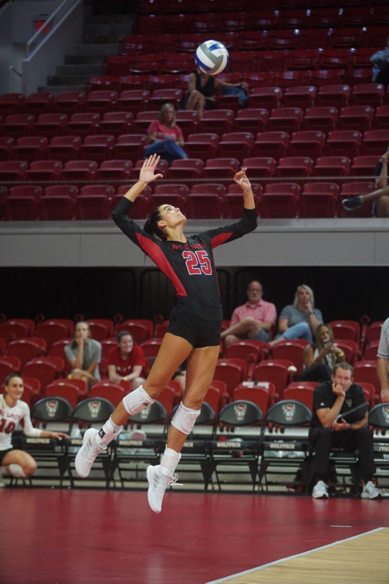 Junior middle blocker Riley Shaak prepares to spike the ball against Western Carolina University on Friday, Sept. 9, 2022 at Reynolds Coliseum. Shaak had three kills in the 3-0 loss to Western Carolina University.