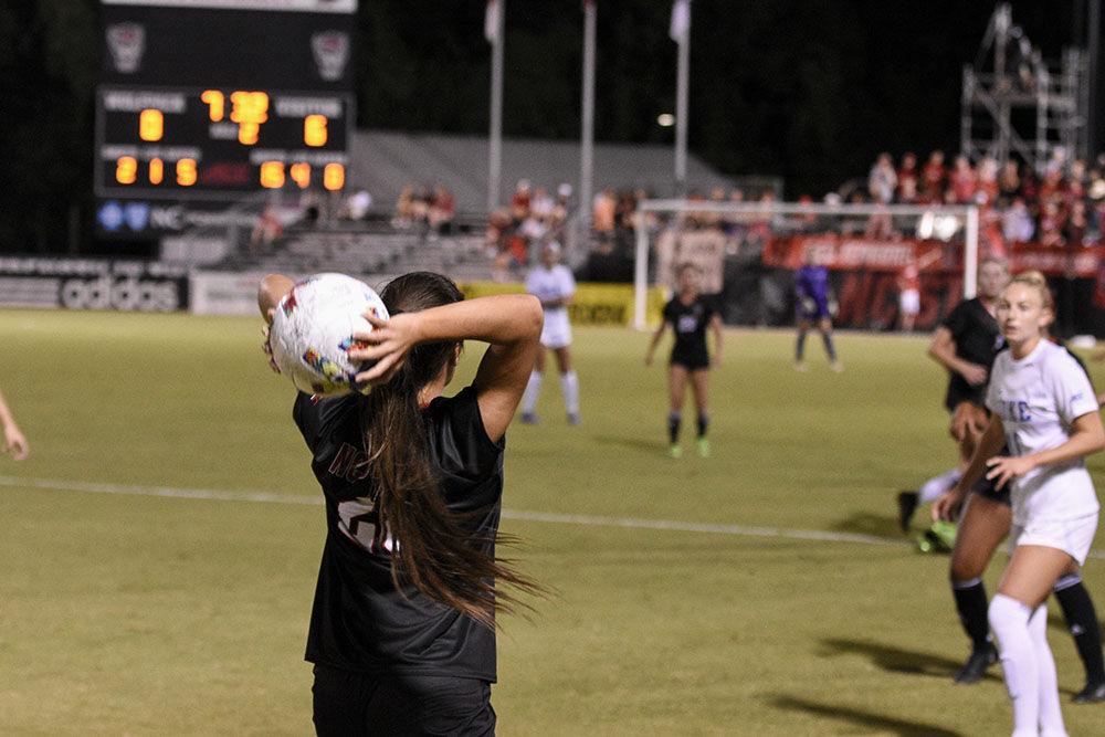 Sophomore defender Kayla Siddiqi throws the ball into play after an offside during the match against the Blue Devils at Dail Soccer Field on Sunday, Sept. 25, 2022. NC State lost 6-0.