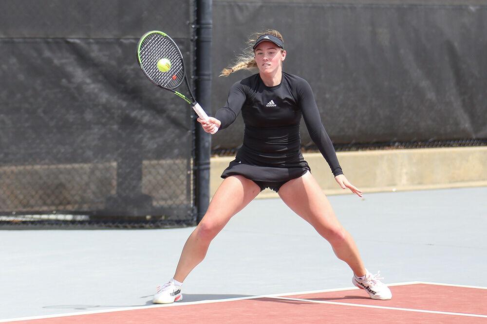 Sophomore Amelia Rajecki forehands the ball during the match against Notre Dame on Saturday, April 16, 2022 at J.W. Isenhour Tennis Center. Rajeck won her singles match and helped lead to a Wolfpack win 7-0.