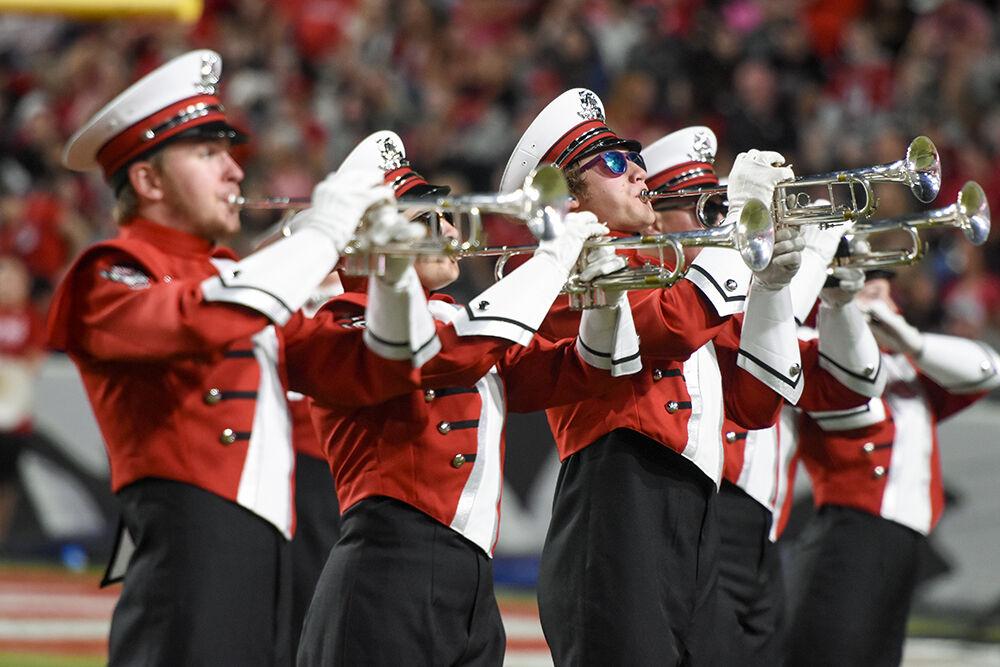 Members of the marching band perform during the game football game against UConn's halftime show at Carter-Finley Stadium on Saturday, Sept. 24, 2022. NC State beat UConn 41-10.