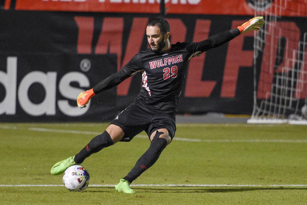 Sophomore goalkeeper Lucas Hatsios kicks the ball during the match against UNC-Chapel Hill on Friday,&#160;Oct. 14, 2022 at Dail Soccer Field. Hatsios had two saves. NC State tied 2-2 with&#160;UNC-Chapel Hill.