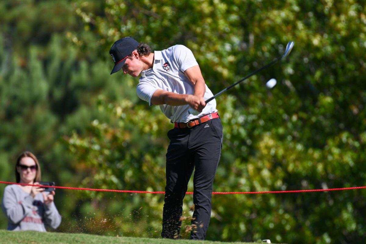 Freshman Joey Lenane tees off during the Wolfpack Intercollegiate tournament on Saturday, Oct. 15, 2022. Lenane had a score of 6-over. NC State tied for second place.