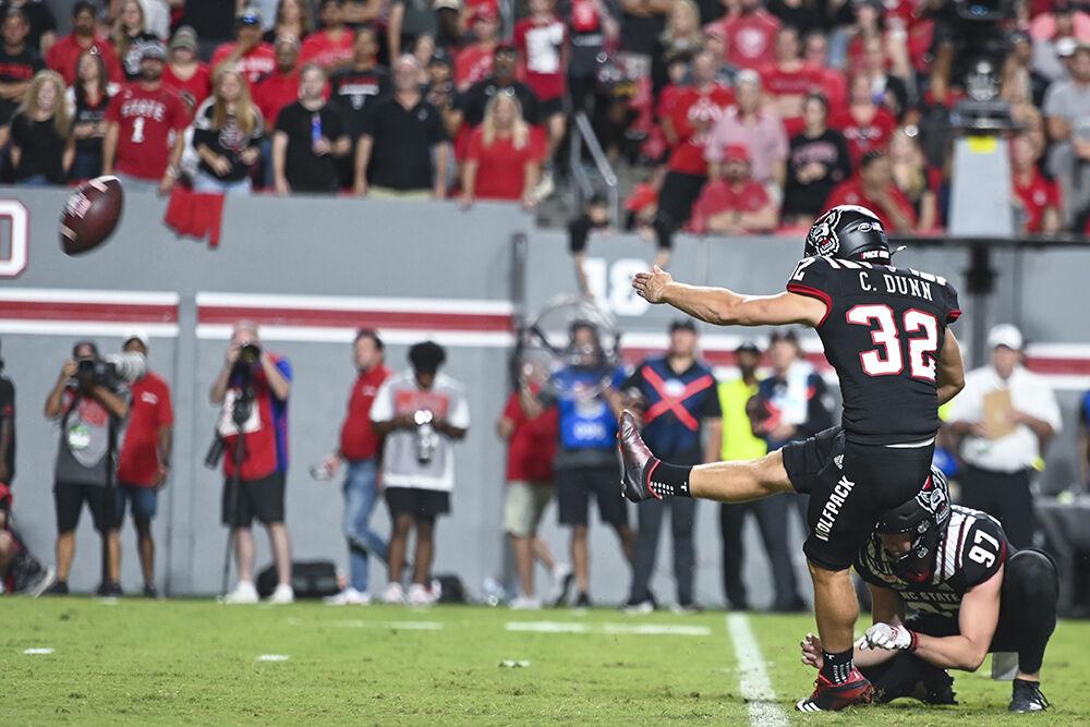 Graduate student kicker Christopher Dunn kicks the ball during the football game against Texas Tech at Carter-Finley Stadium on Saturday, Sept. 17, 2022. The Wolfpack beat the Raiders 27-14.