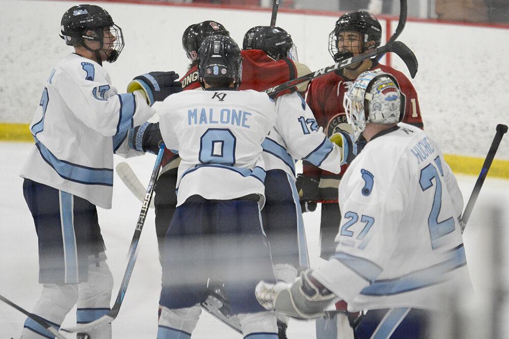 The NC State and UNC-Chapel Hill players argue during the game against UNC-Chapel Hill game at Wake Competition Center on Friday, Sept. 30, 2022. NC State lost 5-3.