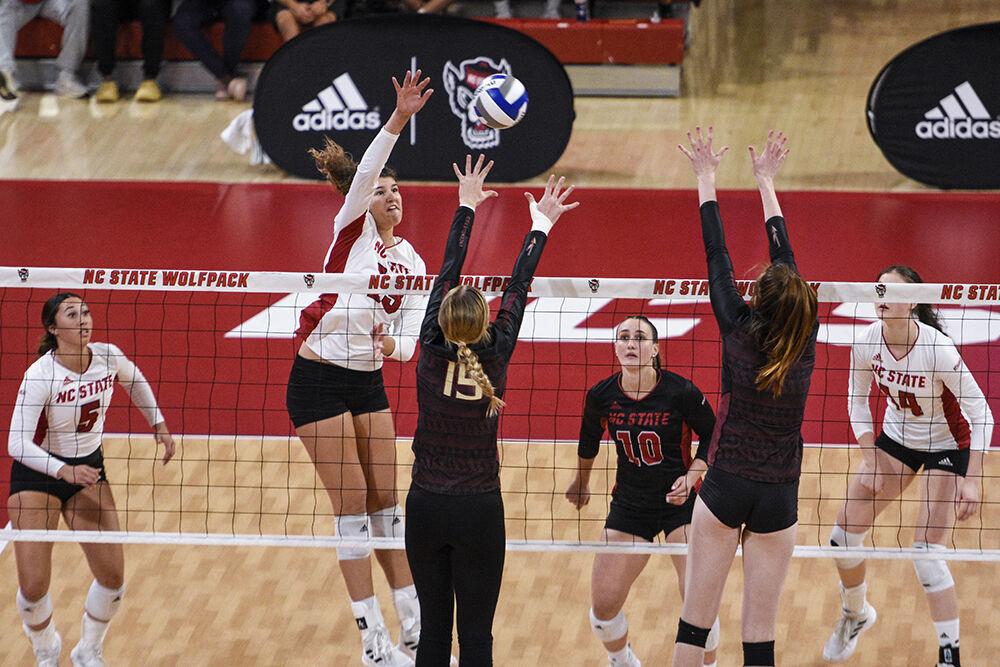 Graduate opposite hitter Vanja Bukilic spikes the ball during the game against Florida State on Friday, Sept. 30, 2022 in Reynolds Coliseum. Bukilic had six kills throughout the game. NC State won the game 3-0.