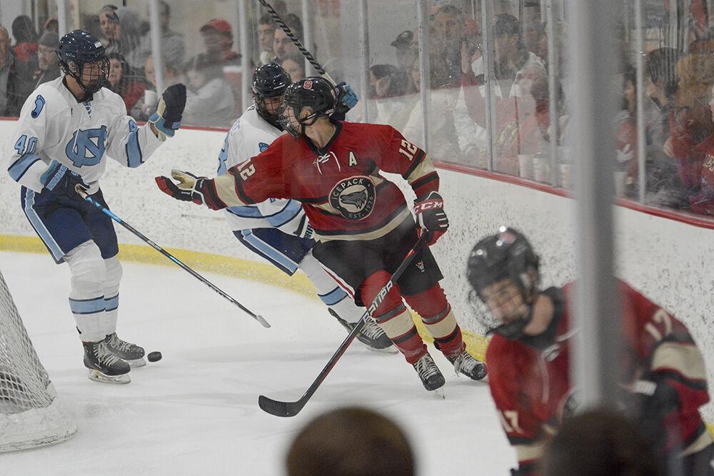 Senior forward Matt Miller bickers with a UNC-Chapel Hill player during the NC State versus UNC-Chapel Hill game at Wake Competition Center on Friday, Sept. 30, 2022. NC State lost 5-3.