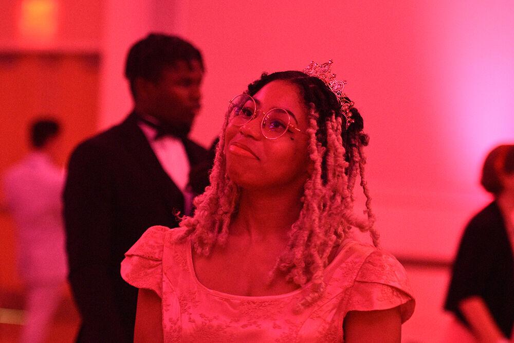 Cynthia Bilal, a graduate student studying art and design, enjoys herself at the Red &amp; White Ball on Saturday, Oct. 22, 2022 in Talley Student Union. The Red &amp; White Ball was NC State's annual formal dance and was hosted by the University Activities Board.