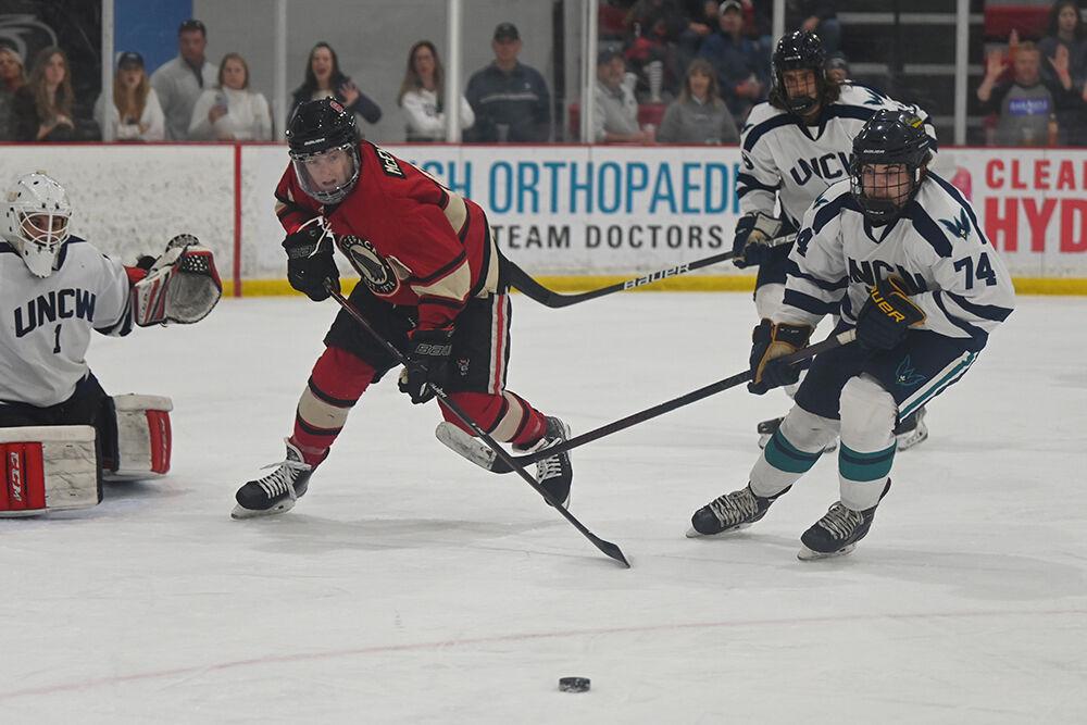 Freshman forward Thomas McEneny races to the puck during the game against UNC-Wilmington at Wake Competition Center on Friday, Oct. 14, 2022. Icepack won 4-1.