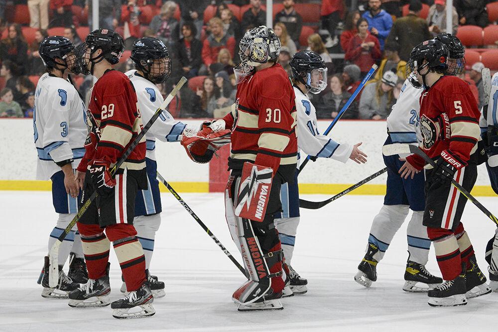 The NC State and UNC-Chapel Hill players shake hands after the NC State versus UNC-Chapel Hill game at Wake Competition Center on Friday, Sept. 30, 2022. NC State lost 5-3.
