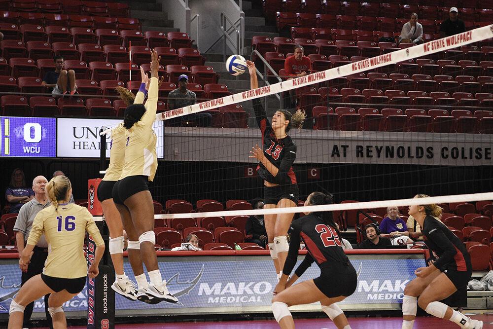 Graduate opposite hitter Vanja Bukilic spikes a ball in the game versus WCU on Friday, Sept. 9, 2022 in Reynolds Coliseum. Bukilic had eight kills during NC State&#8217;s 3-0 loss to the Catamounts.